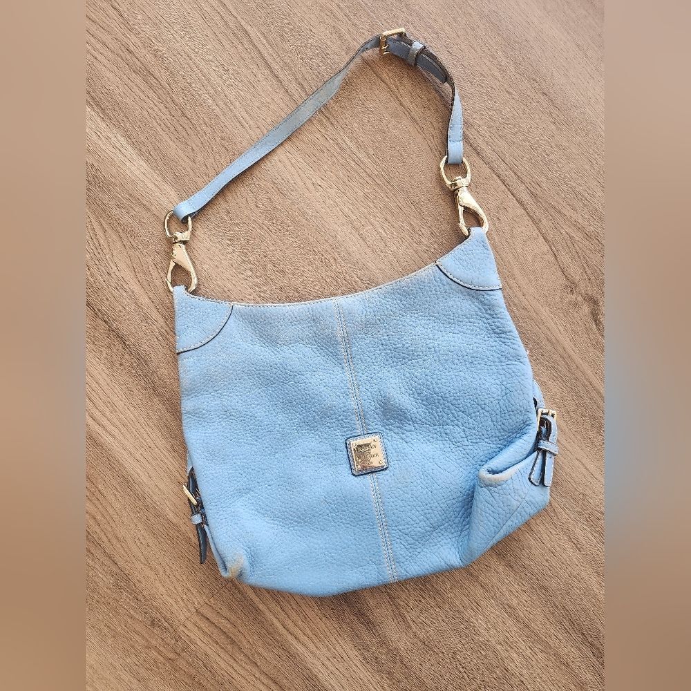 Dooney & Bourke Blue and Gold Shoulder Bag with Elegant Design